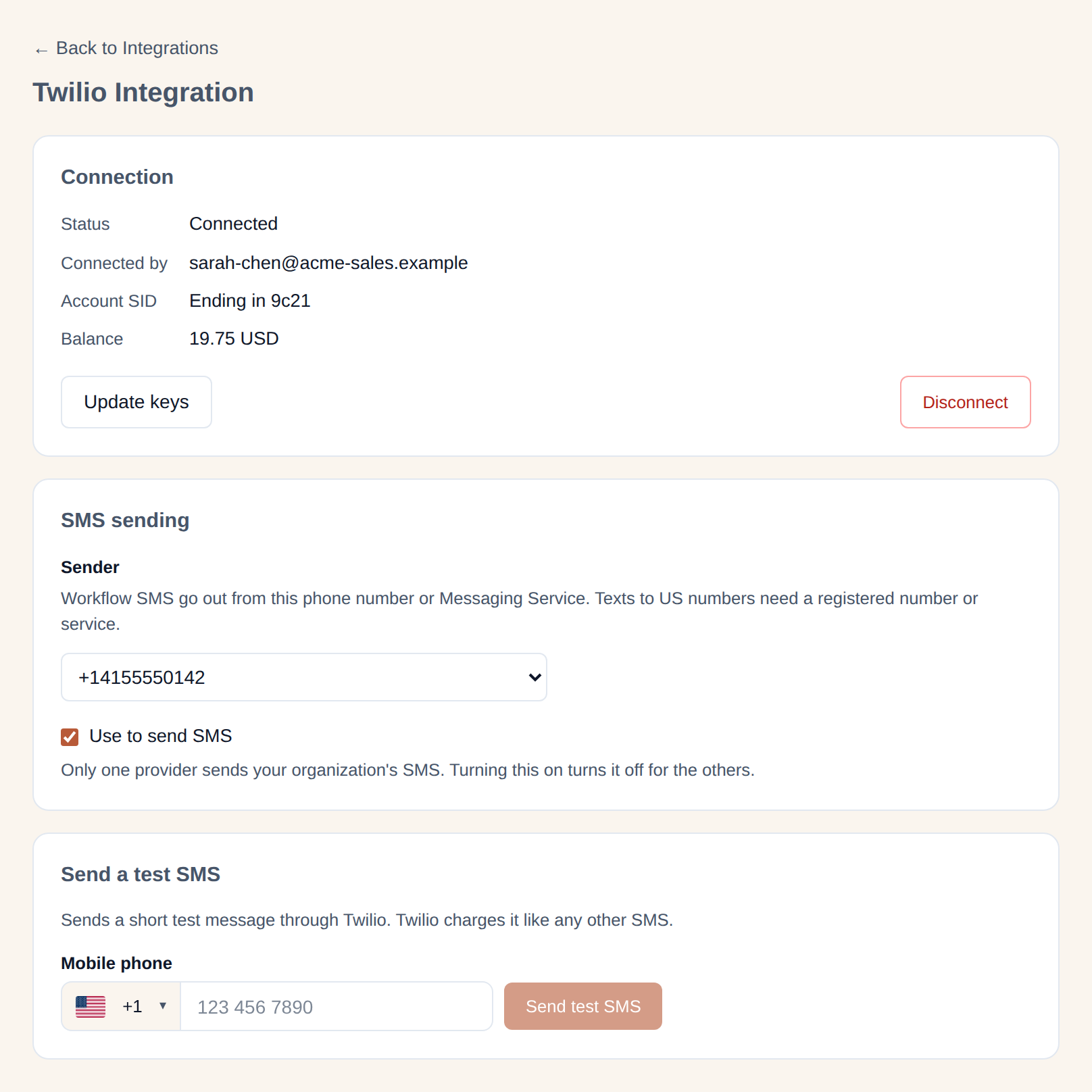The Twilio Integration settings page: a Connection card with status, connected by, Account SID ending, balance, Update keys and Disconnect; an SMS sending card with the Sender dropdown and 'Use to send SMS'; and a 'Send a test SMS' card with a Mobile phone field